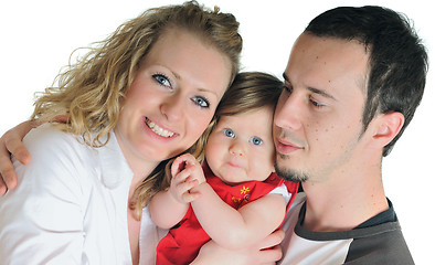 Image showing happy young family together in studio