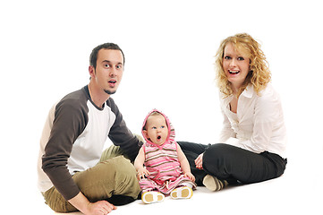 Image showing happy young family together in studio