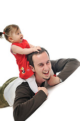 Image showing young father  play with beautiful daughter 