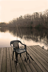 Image showing Fishing Poles on Pier