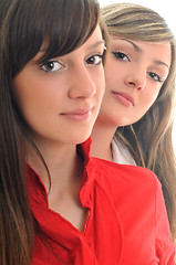 Image showing two young girls isolated on white