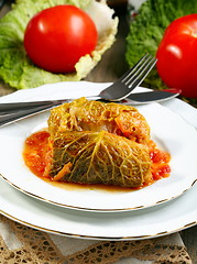 Image showing Stuffed savoy cabbage with tomato sauce.