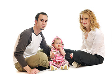 Image showing happy young family together in studio