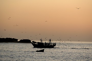 Image showing Sunset on fish boat