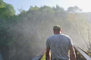 Image showing man waterfall