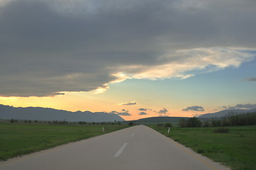 Image showing countryroad adventure with beautiful sunset