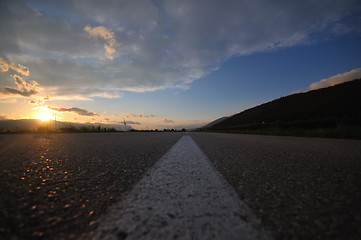 Image showing countryroad adventure with beautiful sunset