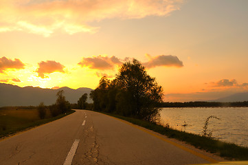 Image showing countryroad adventure with beautiful sunset