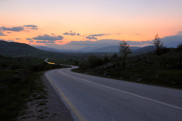 Image showing countryroad adventure with beautiful sunset