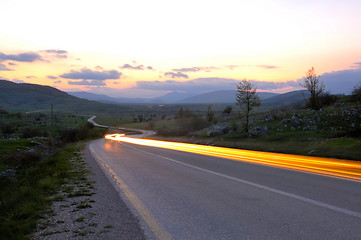 Image showing countryroad adventure with beautiful sunset