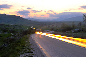 Image showing countryroad adventure with beautiful sunset