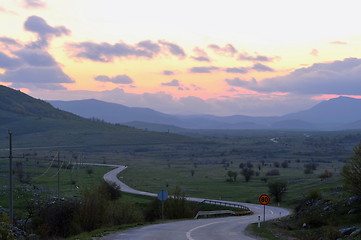 Image showing countryroad adventure with beautiful sunset