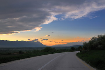 Image showing countryroad adventure with beautiful sunset