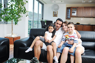 Image showing young family at home