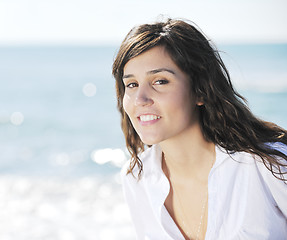 Image showing happy young woman on beach