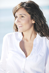 Image showing happy young woman on beach