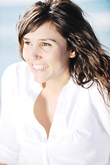 Image showing happy young woman on beach