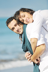 Image showing happy young couple have fun at beautiful beach
