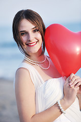 Image showing romantic beach wedding at sunset