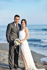 Image showing romantic beach wedding at sunset