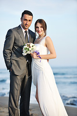 Image showing romantic beach wedding at sunset