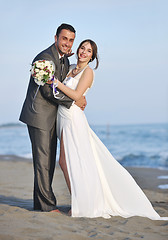 Image showing romantic beach wedding at sunset