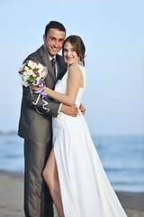 Image showing romantic beach wedding at sunset