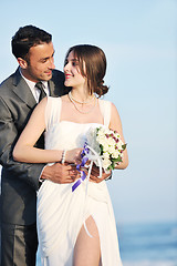 Image showing romantic beach wedding at sunset