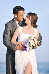 Image showing romantic beach wedding at sunset