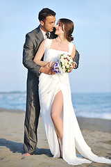 Image showing romantic beach wedding at sunset