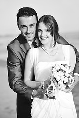 Image showing romantic beach wedding at sunset