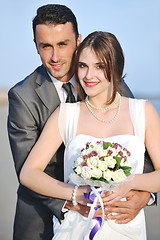 Image showing romantic beach wedding at sunset