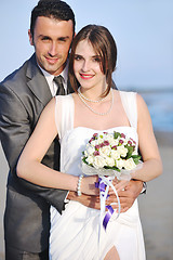 Image showing romantic beach wedding at sunset