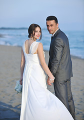 Image showing romantic beach wedding at sunset