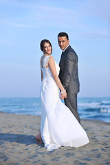 Image showing romantic beach wedding at sunset