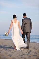 Image showing romantic beach wedding at sunset