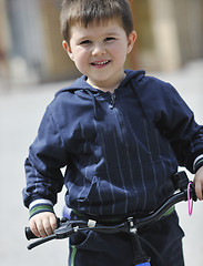 Image showing little boy ride bicycle