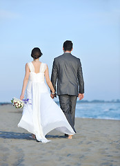 Image showing romantic beach wedding at sunset