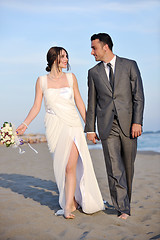 Image showing romantic beach wedding at sunset