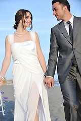 Image showing romantic beach wedding at sunset