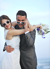 Image showing romantic beach wedding at sunset