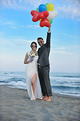 Image showing romantic beach wedding at sunset