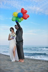 Image showing romantic beach wedding at sunset