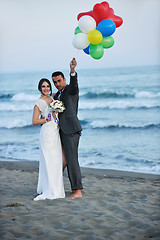 Image showing romantic beach wedding at sunset