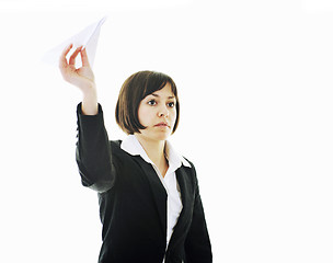 Image showing business woman throwing  paper airplane 