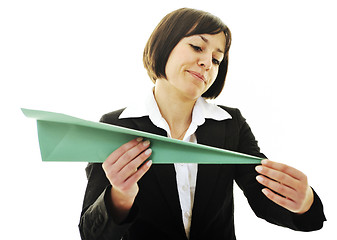 Image showing business woman throwing  paper airplane 