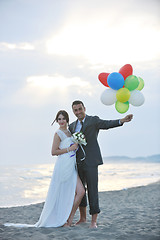 Image showing romantic beach wedding at sunset