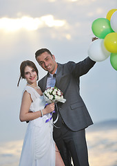 Image showing romantic beach wedding at sunset