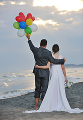 Image showing romantic beach wedding at sunset