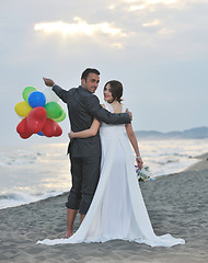 Image showing romantic beach wedding at sunset